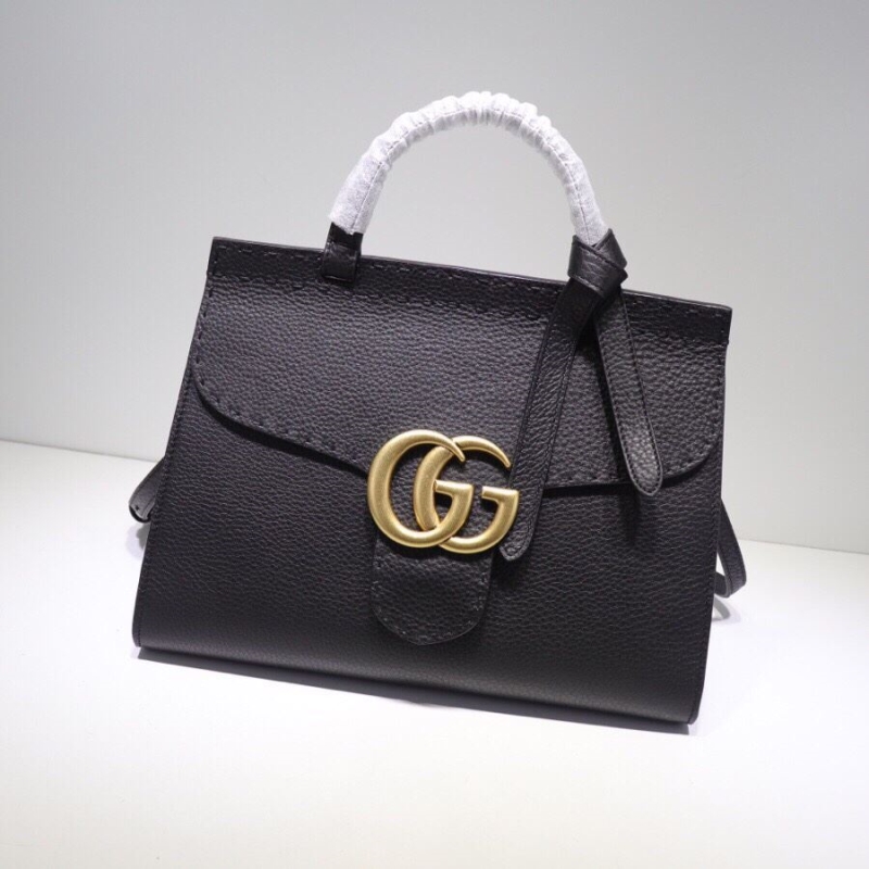 G*u*i top handle bags